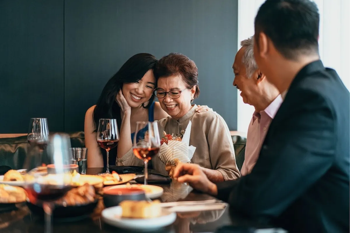 People celebrating together over dinner